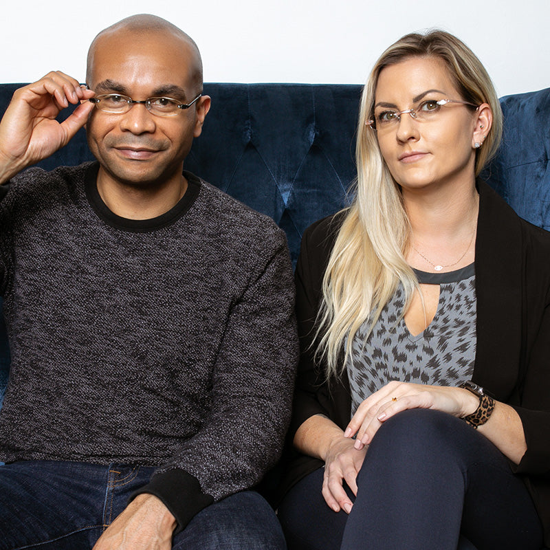 Man and woman wearing Visualites 5 oval rimless reading glasses