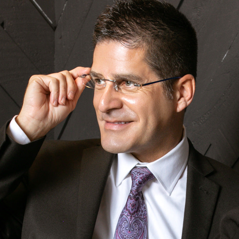 Man wearing professional rimless readers with modern design
