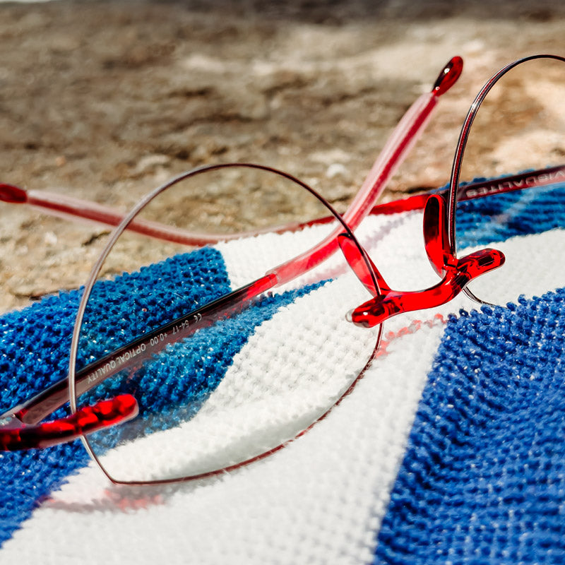 Visualites Amour Quality Reading Glasses With Progressive Lenses In Red On A Blanket