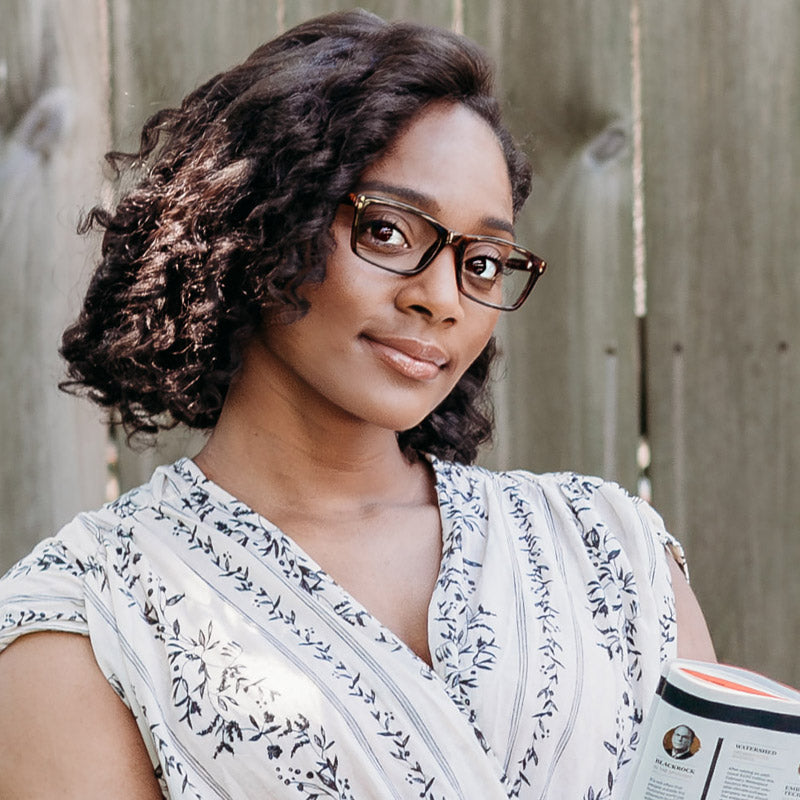 Woman wearing stylish reading glasses with durable full-frame design