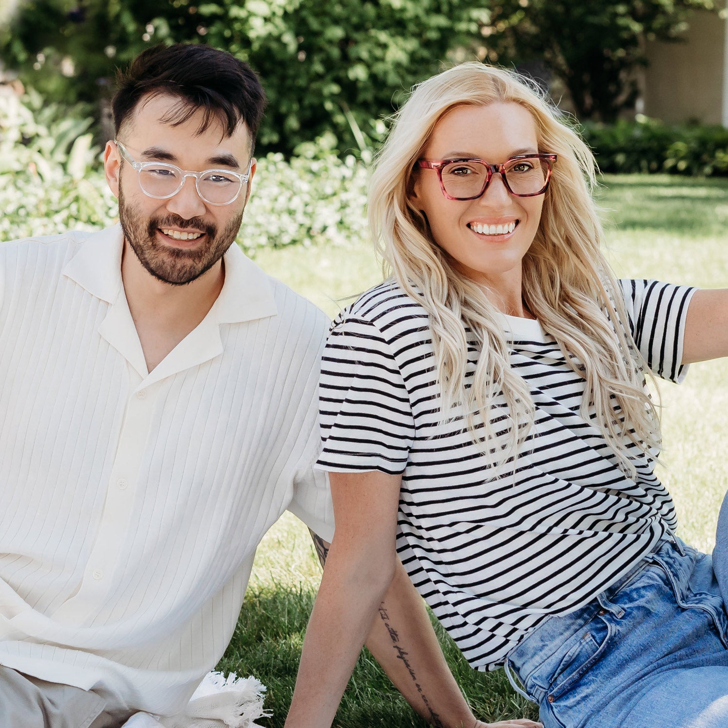 Man and woman wearing readers from the Visualites Lumiere full frame reading glasses collection